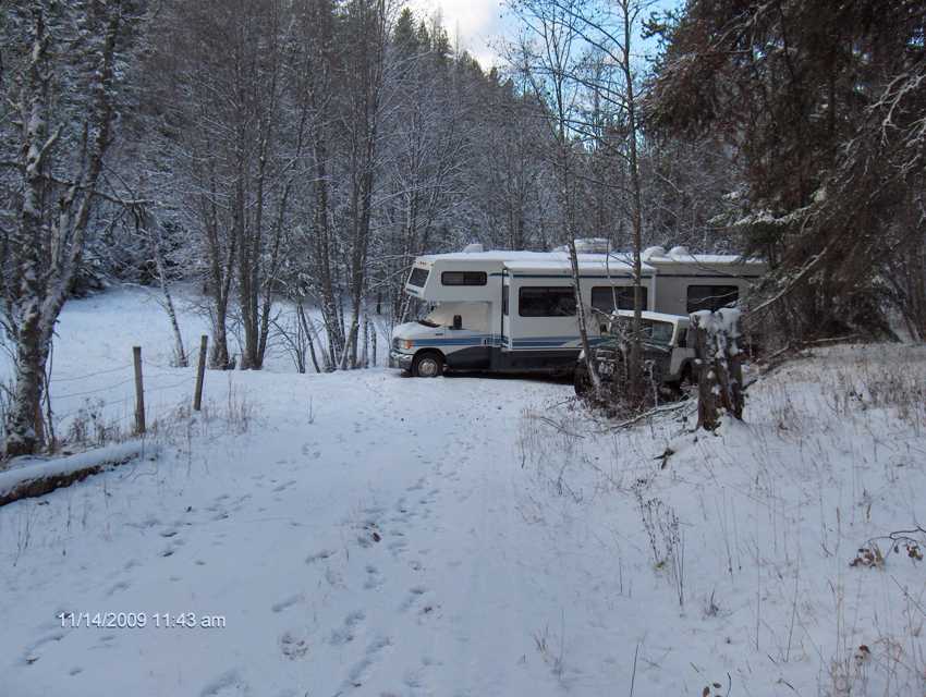 The motor home and Jeep looing West down the driveway