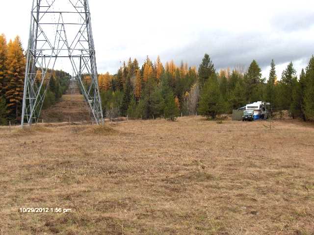 Looking West under the power lines with camp on the right