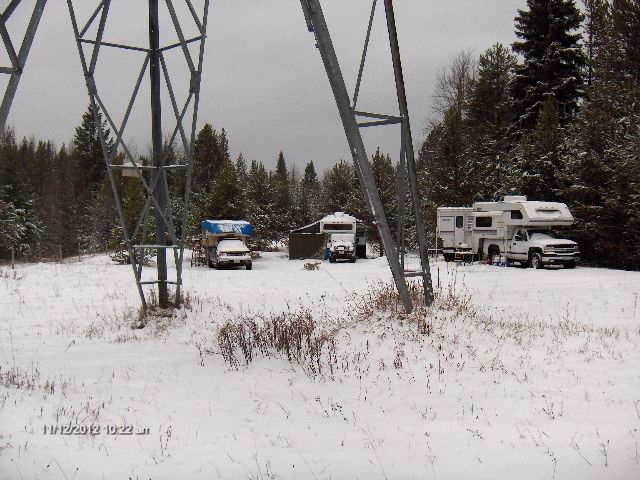 The Camp in the snow and cold through the power line legs.