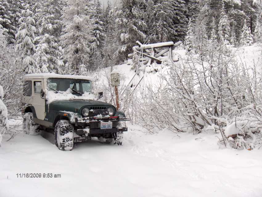 The Jeep in the snow coming out from the back of Jim Cr. mine rd.