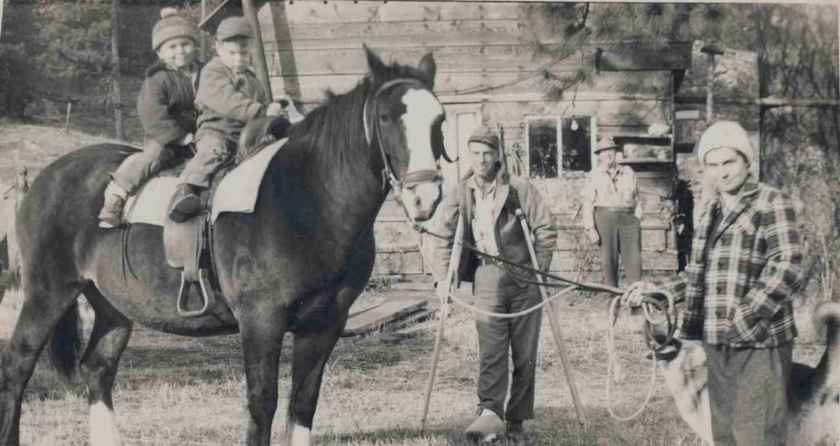 Bob and I on Browny with mom in front and dad and pappy up at the ranch